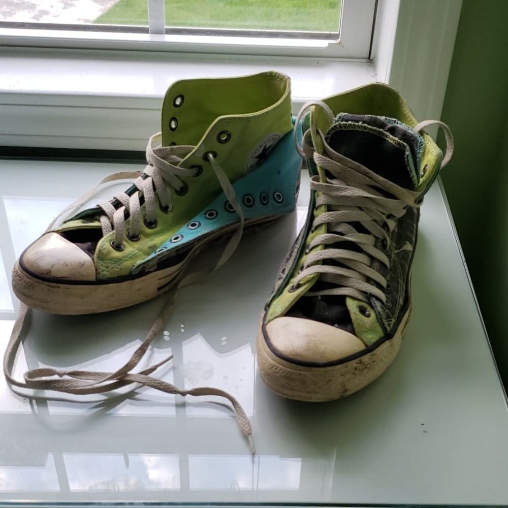 Custom designed one of a kind converse shoes.